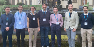 Group photo of APT Kristalization team in front od Dechema building Frankfurt